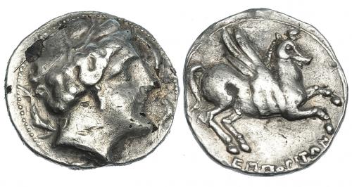 19 - EMPORION. Dracma. A/ Cabeza femenina con tocado vegetal a der. rodeada de tres delfines. R/ Pegaso con cabeza modificada a der.; debajo ley. griega EMPORITON. AR 4,08 g. CNH-50. I-1108. ACIP-200. Hoja y golpecitos. MBC-/MBC. Rara.