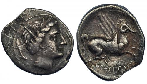 20 - EMPORION. Dracma. A/ Cabeza femenina con tocado vegetal a der. rodeada de tres delfines esquemáticos. R/ Pegaso con cabeza modificada a der.; debajo ley. griega (E)MPORITO(N). AR 4,39 g. CNH-36. I-1108. ACIP-186. . Defectos de metal. MBC. Rara. Ex col. Cervera, ex HSA 12413.