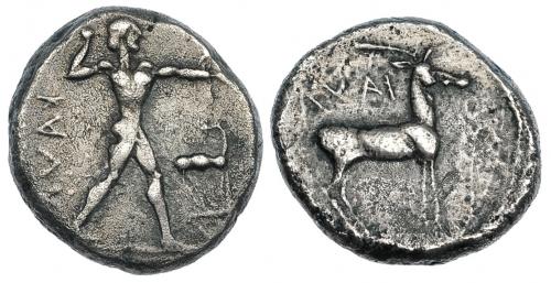 51   -  BRUTTIUM. Kaulonia. Estátera (480-380 a.C.). A/ Apolo a der., delante ciervo con cabeza vuelta; ley. retrógrada KAVL. R/ Ciervo a der.; encima ley. griega retrógrada KAVL. COP-1709. SBG-462. Porosidades. MBC.