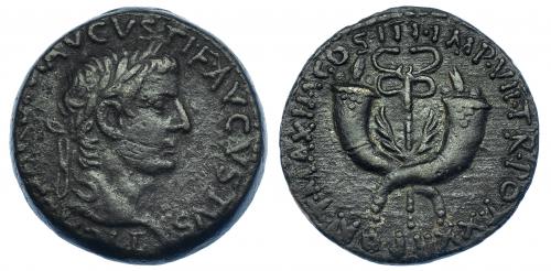 311 - TIBERIO. As. Commagene (19-20 d.C.). A/ Cabeza laureada a der.; TI CAESAR DIVI AVGVSTI F AVGVSTVS. R/ Dos cornucopias cruzadas con caduceo; PONT MAXIM COS III IMP VII TR POT XXII. AE 13,78 g. RIC-90. RPC-I, 3869. Rayitas en anv. MBC.