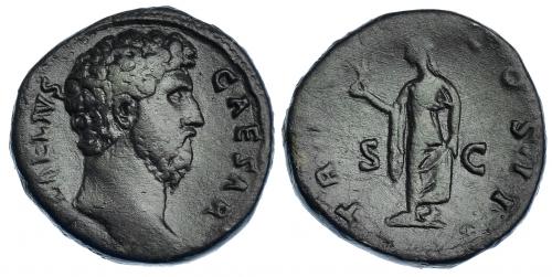 351 - AELIO. As. Roma (137). A/ Cabeza de Aelio a der.; L. AELIVS CAESAR. R/ Spes a izq. con flor; TR (POT) COS II, S-C. RIC-1067. Pátina oscura. MBC/MBC-. Muy escasa.