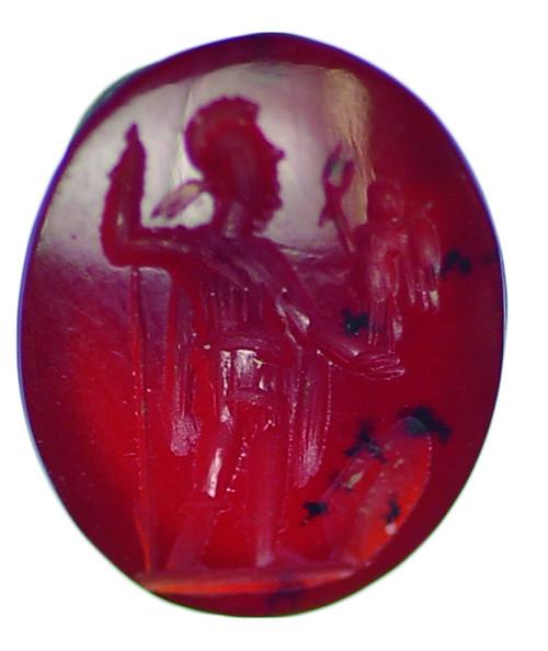 2040 - ROMA. Imperio Romano. Entalle (I d.C.). Ágata roja. Minerva de pie a der., sujetando victoria y lanza. Escudo a sus pies. Longitud 14 mm.
