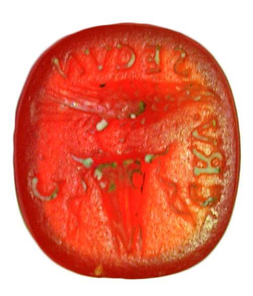 2041 - ROMA. Imperio Romano. Entalle (I-II d.C.). Cornalina. Con representación de ave sujetando espiga. Alrededor leyenda CRV. SECVN. C. Longitud 11 mm.