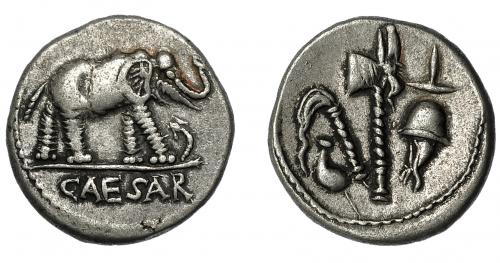 112   -  JULIO CÉSAR. Denario. Ceca móvil (49-48 a.C.). A/ Elefante a der. pisando carnyx galo; CAESAR. R/ Instrumentos sacerdotales. AR 3,68 g. 17,1 mm. CRAW-443.1. FFC-50. Hojita en anv. MBC.