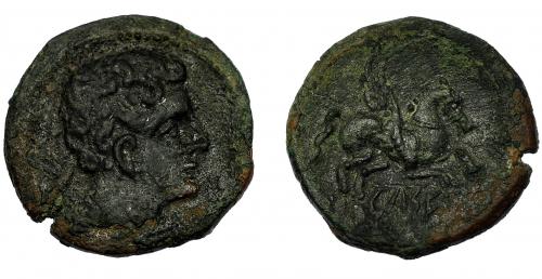 45 - KELSE. Mitad. A/ Cabeza masculina a der., detrás delfín? R/ Pegaso a der., debajo, bajo línea KeLSE. AE 6,30 g. 21,9 mm. CNH-3. I-789. ACIP-1474. Pátina oscura. Pequeña grieta. MBC. Muy rara.