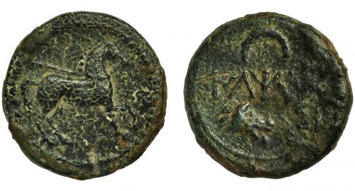 11 - ILTIRTA. Semis. A/ Cabeza de lobo a der., encima creciente y ley. Ibérica; ILTi(Rta). R/ Caballo al paso con rienda suelta a der. AE 3,89 g. 17 mm. ACIP-1272. I-1483. Vanos. Pátina verde. MBC. Muy escasa.