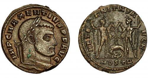 239 - MAJENCIO. Follis. Ostia (309). R/ Cástor y Pollux sujetando sus caballos; AETERNITAS AVG N, exergo MOSTA. AE 6,00 g. 23 mm. RIC-16. Pequeñas marcas. MBC+.