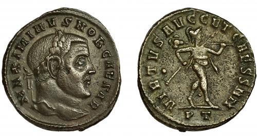 245 - MAXIMINO II. Follis. Ticinum (305). R/ VIRTVS AVGG ET CAESS NN, punto en el campo, PT en exergo. Ae 7,82 g. 27 mm. RIC-58b. Hojita en anv. MBC.
