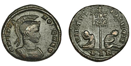 262 - CRISPO. Follis. Londinium (320-321). R/ Estandarte con leyenda VOT/XX entre dos cautivos; exergo PLN. AE 3,18 g. 19 mm. RIC-196. MBC-.
