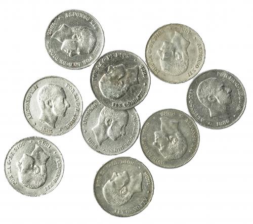 360 - ALFONSO XII. Lote 9 piezas de 50 centavos de peso. 1885. Manila. MBC-/MBC+.