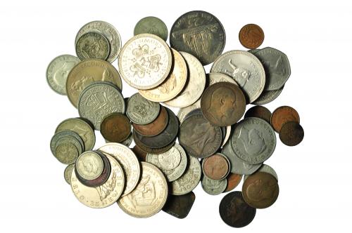383   -  GRAN BRETAÑA. Lote 60 monedas extranjeras (Gran Bretaña, Commonwealth y colonias) de varios valores, 13 de ellas de plata. MBC a SC.