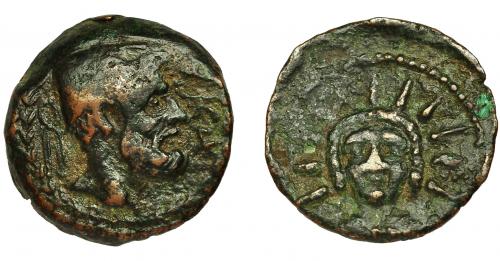 2047 - HISPANIA ANTIGUA. MALAKA. Unidad. A/ Cabeza de Vulcano con gorro cónico a der., delante mlk'. R/ Busto radiado frontal. ¿Helios? AE 6,86 g. 23,4 mm. I-1726. ACIP-787. MBC-.