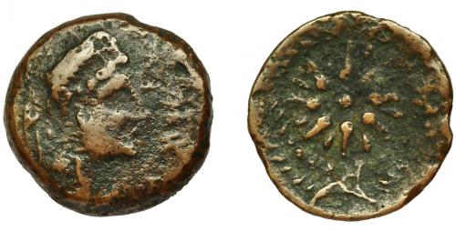 2052 - HISPANIA ANTIGUA. MALAKA. Unidad. A/ Cabeza de Vulcano con bonete a der., detrás mlk' y tenazas. R/ Estrella de dieciséis puntas con glóbulo central. AE 5,5 g. 20,9 mm. I-1734. ACIP-803. BC-/BC+. Muy rara.