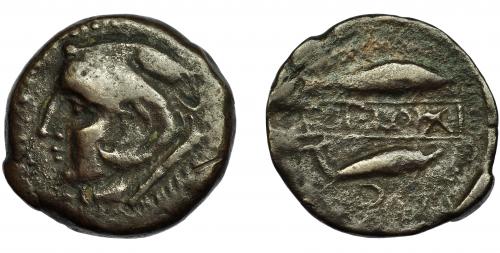 2091 - HISPANIA ANTIGUA. SEKS. Unidad. A/ Cabeza de Melkart a izq., clava sobre el hombro. R/ Atún y delfín a der., en medio en cartela mp'l sks, encima estrella y debajo creciente a izq. con glóbulo central. AE 10,9 g. 27 mm. I-2234. ACIP-821. Vanos. MBC-/BC+. Rara.