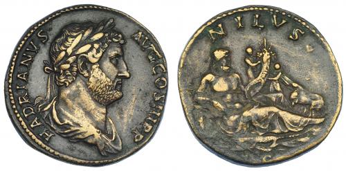 532 - IMPERIO ROMANO. ADRIANO. Sestercio. Roma (134-138). A/ Busto laureado y drapeado a der.; HADRIANVS AVG COS III P P. R/ Nilo reclinado a der. Sobre roca sosteniendo cornucopia por la que trepan dos niños, a der. cocodrilo y en el agua, hipopótamo; NILVS, exergo SC. AE 26,54 g. 32 mm. RIC-1704. Leves concreciones en rev. MBC. Muy escasa.
