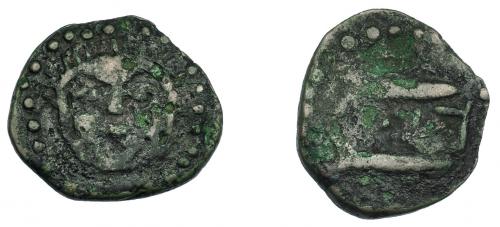 226 - HISPANIA ANTIGUA. ASIDO. Semis. A/ Cabeza frontal de Melkart con leonté. R/ Dos atunes a der., en medio b'b'l. AE 3,49 g. 20,5 mm. I-155. ACIP-920. BC+. Rarísima.