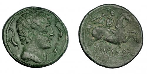 236 - HISPANIA ANTIGUA. ILTIRTA. As. A/ Cabeza masculina a der. rodeada de tres delfines. R/ jinete con palma y clámide a der., debajo sobre línea ILTiRTa. AE 12,8 g. 26,2 mm. I-1465. ACIP-1256. Pátina verde. MBC.