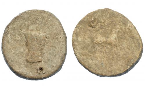 291 - HISPANIA ANTIGUA. Plomo monetiforme. Serie de las minas. A/ Cabeza frontal de toro. R/ ¿Caballo a der.? Pb 87,09 g. 45,8 mm. CCP-sim. a pp. 28-29. RC.