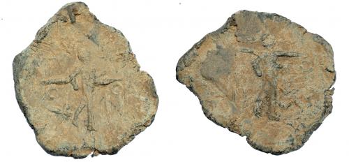 295 - HISPANIA ANTIGUA. Plomo monetiforme. ¿Serie de las minas? A/ Figura masculina avanzando a der., detrás OX, delante O. R/ Figura avanzando a der. con herramienta al hombro, delante O. Pb 29,37 g. 44,4 mm. CCP-no. MBC.