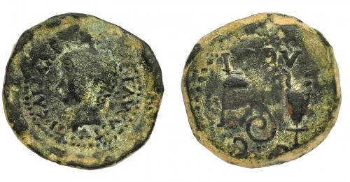 1014 - HISPANIA ANTIGUA. ACCI. Semis. Tiberio. A/ Cabeza laureada a izq.; TI CAESAR (DIVI AV)G F AVGVSTVS. R/ Instrumentos sacerdotales; C I G/ AC(CI). AE 10,66 g. 25,4 mm. I-40. APRH-140. ACIP-3008. Pátina oscura con erosiones. BC+/MBC-. Escasa.
