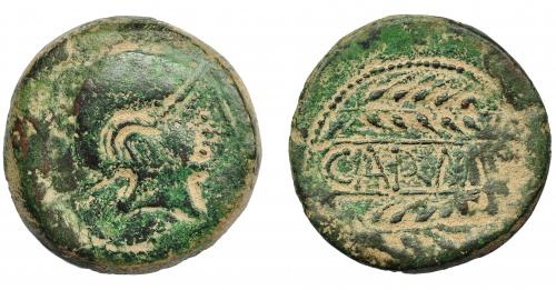 1154 - HISPANIA ANTIGUA. CARMO. As. A/ Cabeza galeada a der., alrededor láurea. R/ Dos espigas a der., en medio entre líneas CARM(O). AE 18,79 g. 30,8 mm. I-454. ACIP-2382. Pátina verde. MBC-/MBC. Compra privada Pliego (1992).