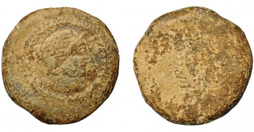 1167 - HISPANIA ANTIGUA. CARMO. Plomo monetiforme. Módulo dupondio. A/ Cabeza galeada a der. dentro de láurea. R/ Corona. PB 50,91 g. 40 mm. I-476. CCP-p. 5,2. Finas rayas. BC+/BC-.
