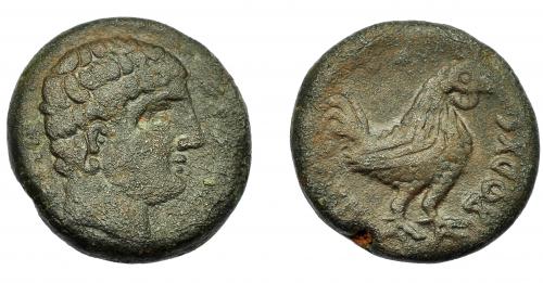 1029 - HISPANIA ANTIGUA. AREKORATAS. Semis. A/ Cabeza masculina a der., delante dos glóbulos (no visibles), detrás signos ibéricos (SOS). R/ Gallo a der., detrás dos glóbulos; (AREI)KoRATaS. AE 12,7 g. 24,7 mm. I-87 vte. ACIP-1470. Pátina oscura. MBC-. Rara.