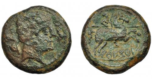 1035 - HISPANIA ANTIGUA. AREKORATAS. As. A/ Cabeza masculina a der. entre dos delfines. R/ Jinete lancero a der., debajo sobre línea AREKoRATa (signos A y Ta nexados). AE 10,59 g. 24,7 mm. I-117. ACIP-1778. Superficies erosionadas. BC/BC+.