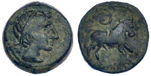 12 - HISPANIA ANTIGUA. CASTULO. Semis. A/ Cabeza masculina diademada a der. R/ Toro a der., encima creciente, debajo KaSTiLO. I-712. ACIP-2109. AE 7,08 g. 21,54 mm. Pátina verde. MBC-. Muy rara.