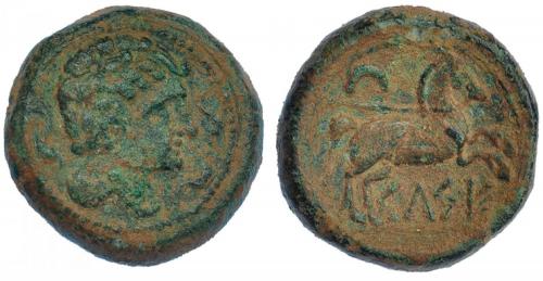 16 - HISPANIA ANTIGUA. KELSE. Semis. A/ Cabeza masculina con cuello vestido a der., alrededor tres delfines. R/ Caballo saltando a der., encima creciente; KELSE. AE 11,30 g. 23,56 mm. I-787. ACIP-1484. Pátina verde rugosa. MBC-/MBC. Muy escasa.