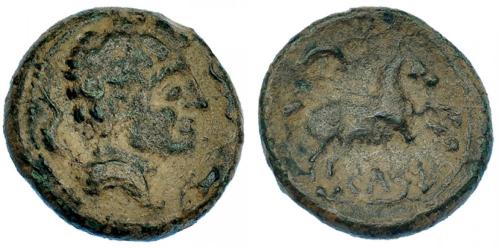 17 - HISPANIA ANTIGUA. KELSE. Semis. A/ Cabeza masculina con cuello vestido a der., alrededor tres delfines. R/ Caballo saltando a der., encima creciente, debajo bajo línea ley. ibérica KeLSE. AE 6,39 g. 20,89 mm. I-787. ACIP-1484. Pátina verde terrosa. MBC-. Escasa.