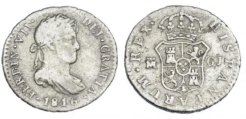 282 - FERNANDO VII. 1/2 real. 1816. Madrid. GJ. VI-348. Hojitas en el rev. BC+.