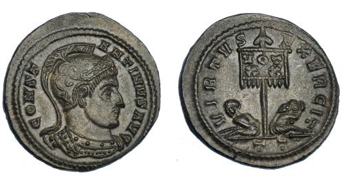 3173 - IMPERIO ROMANO. CONSTANTINO I. Follis. Ticinum (319-320). R/ Dos cautivos flanqueando estandarte con VOT/XX, VIRTVS EXERCIT, exergo TT. VE 3,47 g. 20,4 mm. RIC-114. EBC+.