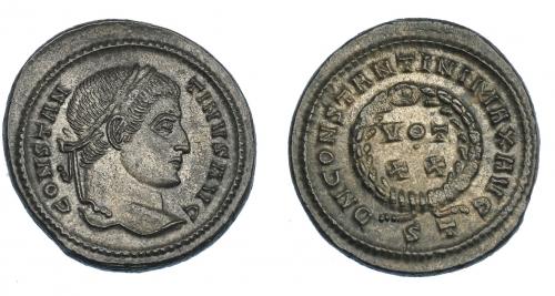 3174 - IMPERIO ROMANO. CONSTANTINO I. Follis. Ticinum (320-321). R/ Láurea rodeando VOT/XX; DN CONSTANTINI MAX AVG, exergo ST. VE 4,54 g. 20,9 mm. RIC-140. EBC/EBC+.
