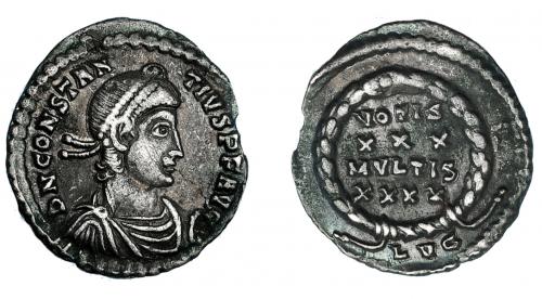 3179 - IMPERIO ROMANO. CONSTANCIO II. Silicua. Lugdunum (360-363). R/ Láurea rodeando VOTIS/ XXX/ MVLTIS/ XXXX, exergo LVG. AR 1,62 g. 17,3 mm. RIC-216. MBC. Ex hallazgo East Harptree (1887).