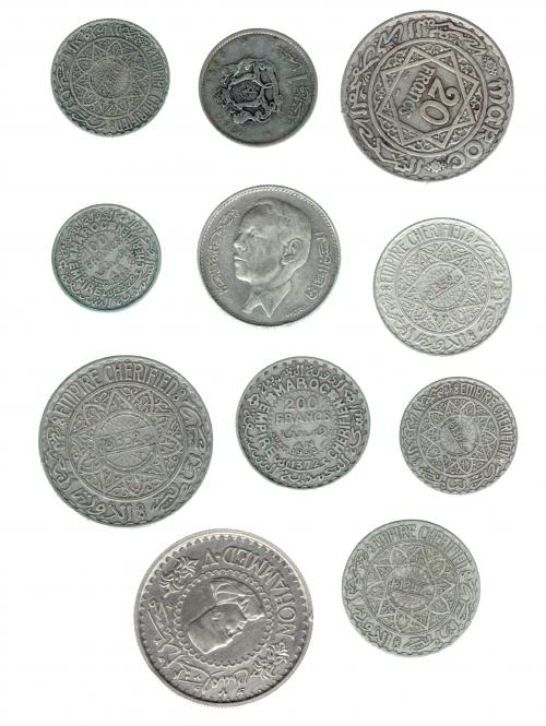 3386 - MONEDAS EXTRANJERAS. MARRUECOS. Lote de 11 monedas: 500 francos de 1956; 200 francos de 1953; 100 francos de 1953; 20 francos de 1347 H y 1352 H; 10 francos de 1347 H y 1352 H; 5 francos de 1347 H y 1352 H; 1 Dirham 1960; y 5 dirham de 1965. MBC/EBC-.