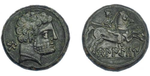 17 - HISPANIA ANTIGUA. BELIKIOM. Unidad. A/ Cabeza masculina con collar a der., detrás signo ibérico Be. R/ Jinete lancero a der., debajo sobre línea BeLIKiOM. AE 9,16 g. 23,2 mm. I-243. ACIP-1433. Pátina verde oscuro. MBC/MBC+.