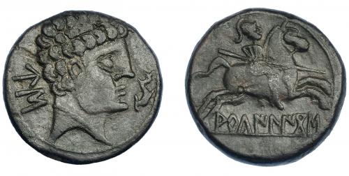 3 - HISPANIA ANTIGUA. ARKAILIKOS. Unidad. A/ Cabezas masculina con collar a der., delante delfín, detrás signos ibéricos US. R/ Jinete lancero a der., debajo sobre línea ARKaILIKoS. AE 12,48 g. 25,1 mm. I-71. ACIP-1810. Pátina marrón verdoso. MBC+/MBC. Escasa.