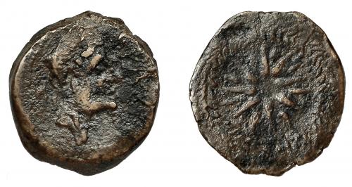 3057 - HISPANIA ANTIGUA. MALAKA. Unidad. A/ Cabeza de Vulcano con bonete a der., detrás mlk' y tenazas. R/ Estrella de dieciséis puntas con glóbulo central. AE 6,26 g. 22,5 mm. I-1734. ACIP-803. BC+. Muy rara.