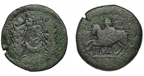 3061 - HISPANIA ANTIGUA. ITUCI. Mitad. A/ Dos espigas, en medio estrella y creciente. R/ Jinete a izq. con casco, rodela y lanza; debajo ITVCI. AE 15,7 g. 31,5 mm. I-1599. ACIP-840. Pátina verde. BC. Rara.