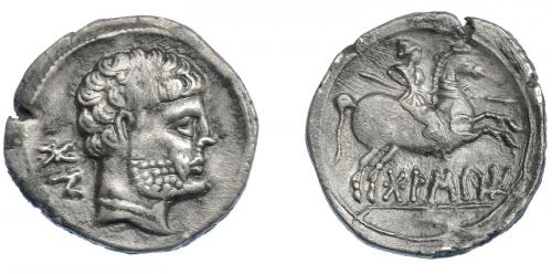 3082 - HISPANIA ANTIGUA. BOLSKAN. Denario. A/ Cabeza masculina barbada y con collar a der., detrás signos ibéricos BoN. R/ Jinete lancero a der., debajo sobre línea BoLSKaN. AR 3,92 g. 20,6 mm. I-1912. ACIP-1423. Cospel abierto. MBC-/MBC.