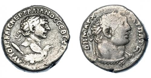 3133 - IMPERIO ROMANO. TRAJANO. Antioquía. Tetradracma (112). A/ Cabeza laureada a der., encima de águila a der., detrás clava. R/ Cabeza de Melkart laureada a der. con leonté por el cuello. AR 13,97 g. 24,72 mm. RPC-II, 3542. Vano en rev. MBC-. Ex colección Guadán 2578.