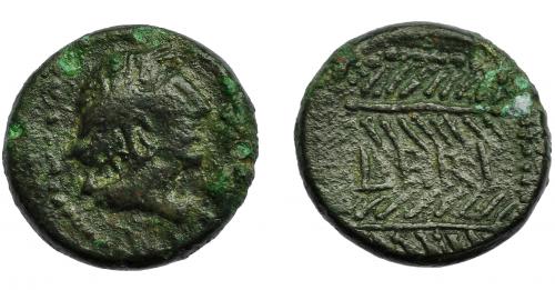 32 - HISPANIA ANTIGUA. CERIT. Semis. A/ Cabeza femenina laureada a der. R/ Dos palmas, en medio CERI. AE 6,93 g. 20,3 mm. I-824. ACIP-2414. Oxidaciones. Pátina verde. MBC-/MBC.