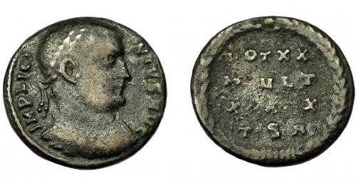 388   -  IMPERIO ROMANO. LICINIO I. Tesalónica (308-310). R/ Láurea rodeando VOT XX/MVLT/XXX, exergo TSA. AE 3,22 g. 16,4 mm. RIC-33-35. BC+.