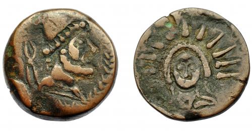 51 - HISPANIA ANTIGUA. MALAKA. Unidad. A/ Cabeza masculina con gorro cónico a der., detrás tenazas y ley. mlk´. R/ Busto frontal radiado. AE 11,63 g. 22,5 mm. I-1727. ACIP-786. Pátina marrón. MBC/MBC-.
