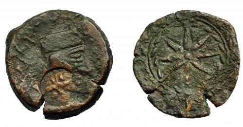 54 - HISPANIA ANTIGUA. MALAKA. Unidad. A/ Cabeza masculina con gorro cilíndrico a der., detrás tenazas y ley. mlk´. R/ Estrella de ocho rayos, alrededor láurea. AE 7,14 g. 23,2 mm. I-1733. ACIP-800. Contramarca en anv. cruz con 4 glóbulos en los ángulos. MBC-. Rara.
