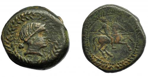 57 - HISPANIA ANTIGUA. OBULCO. Unidad. A/ Cabeza femenina con moño a der., alrededor OBVLCO, todo dentro de láurea. R/ Jinete lancero a der., alrededor láurea. AE 4,3 g. 24,1 mm. I-1830. ACIP-2182. MBC-/BC+. Muy escasa.
