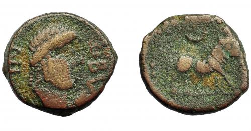 89 - HISPANIA ANTIGUA. OBULCO. Semis. A/ Cabeza de Apolo a der.; OBVL interna-NIG externa. R/ Toro a der., encima creciente. AE 4,67 g. 19,8 mm. I-1832. ACIP-2264. BC+. Rara.