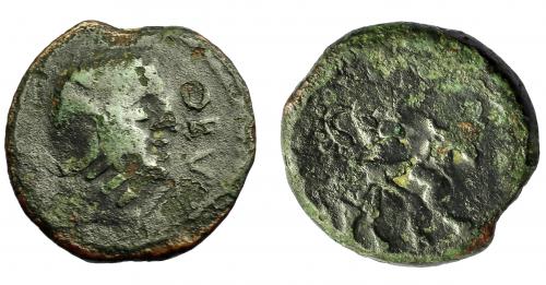 91 - HISPANIA ANTIGUA. OBULCO. Semis. Reacuñación sobre Ebusus. A/ Cabeza de Apolo a der. delante interna OBV(LCO). R/ Bes. AE 5,14 g. 21,6 mm. Pátina verde con erosiones. BC+/RC. Rara.