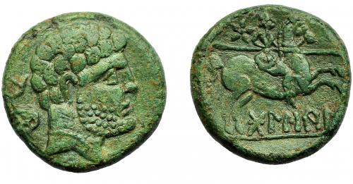 93 - HISPANIA ANTIGUA. BOLSKAN. As. A/ Cabeza con collar a der., detrás delfín. R/ Jinete lancero a der., detrás estrella; debajo sobre línea BoLSKaN. AE 10,42 g. 23,3 mm. Bonita pátina verde. MBC/MBC+.